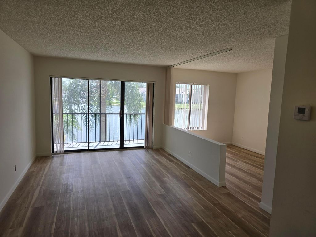 Photo of 1108 N Green Pine Boulevard N #C2, West Palm Beach, FL 33409 (MLS # B26002396)