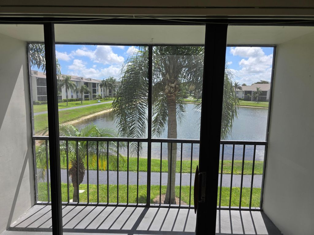 Photo of 1108 N Green Pine Boulevard N #C2, West Palm Beach, FL 33409 (MLS # B26002396)
