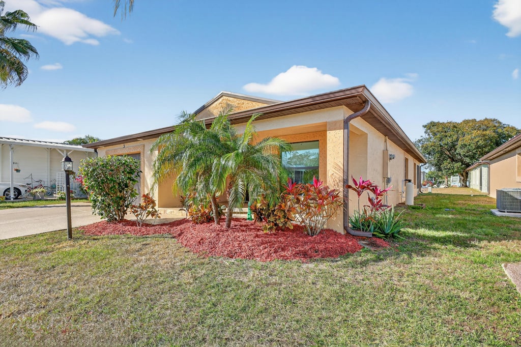 Photo of 3 Los Gatos Lane, Port Saint Lucie, FL 34952 (MLS # R11152715)