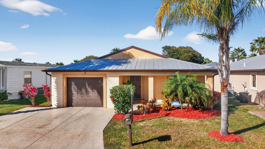 Photo of 3 Los Gatos Lane, Port Saint Lucie, FL 34952 (MLS # R11152715)