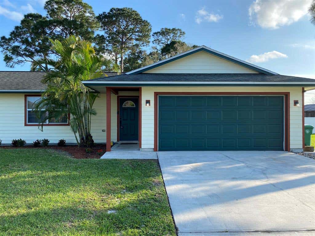 Photo of 590 SW Fairview Avenue, Port Saint Lucie, FL 34983 (MLS # R10694997)