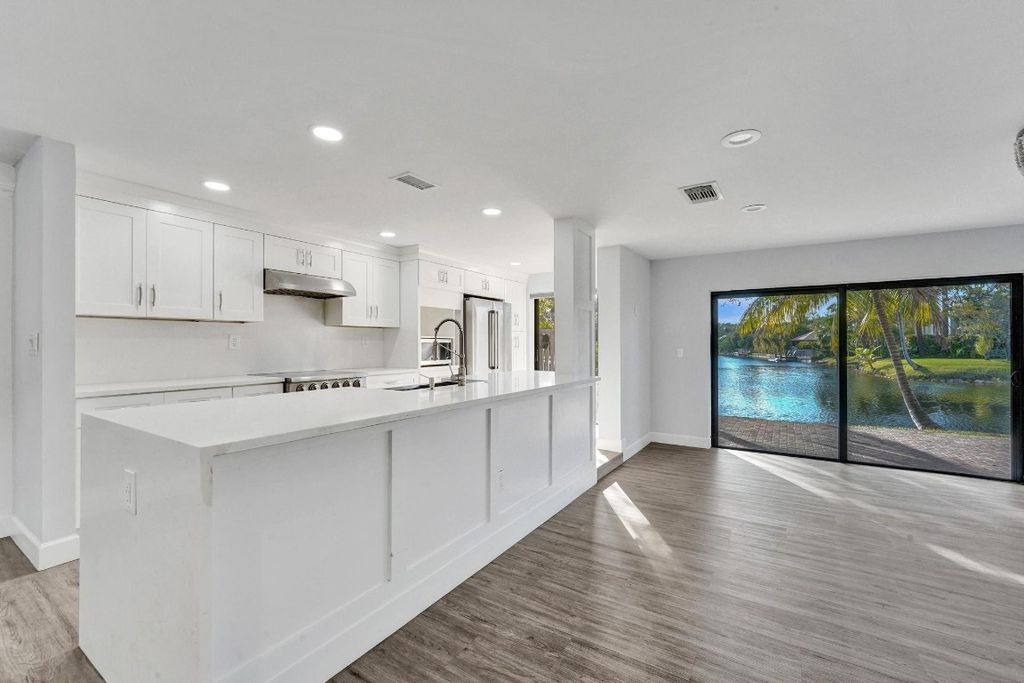 Photo of 9881 Fairway Cove Lane, Plantation, FL 33324 (MLS # F10484002)