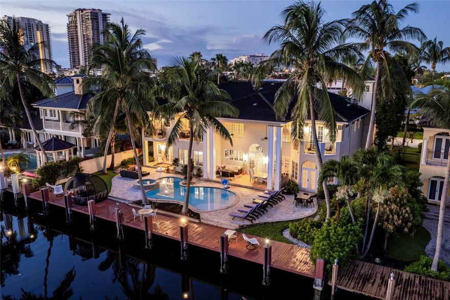 Luxurious Waterfront Living, serene and private, 100' deep water dockage on wide canal for large yacht, in prestigious Seven Isles of Las Olas. This amazing, 2 story Luxury home has 7 bedroom, 7.5 Bathrooms, a large entry Foyer & a huge family room with Wet Bar, floor to ceiling windows flood the home with natural light & provide great water views throughout. beautifully appointed soaring ceilings, warm, fun, Livingroom. Spacious & well-equipped Gourmet kitchen, breakfast area. Formal Dining, Master suite with sitting area and large bathroom, VIP master on 1st floor, spacious guestrooms. 3-car garage, Elevator. Entertainers' paradise, outdoor area with covered patio, Built in BBQ. Heated salt pool & spa, multiple outdoor setting areas. Walking distance to restaurants, galleries & worship.