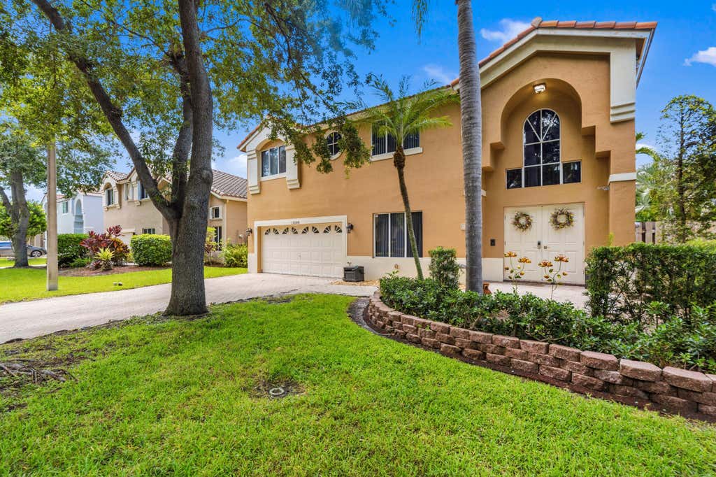 Photo of 11248 Rhapsody Road, Hollywood, FL 33026 (MLS # B26044825)