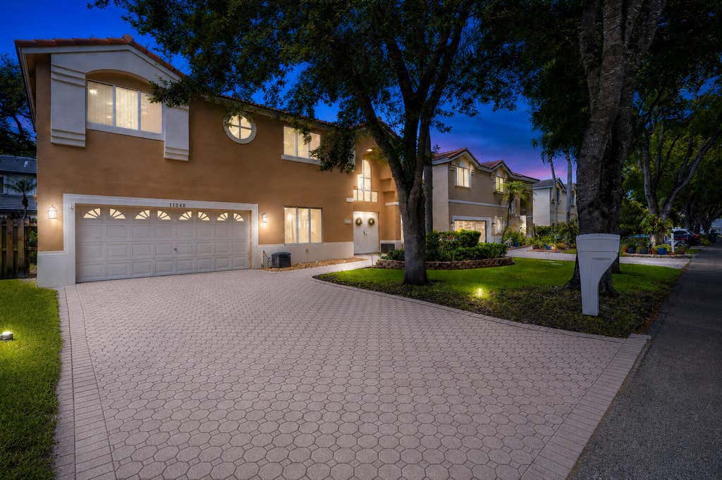 Photo of 11248 Rhapsody Road, Hollywood, FL 33026 (MLS # B26044825)
