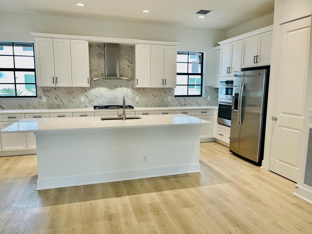 Photo of 5325 Sagan Lane, Palm Beach Gardens, FL 33418 (MLS # R10966314)