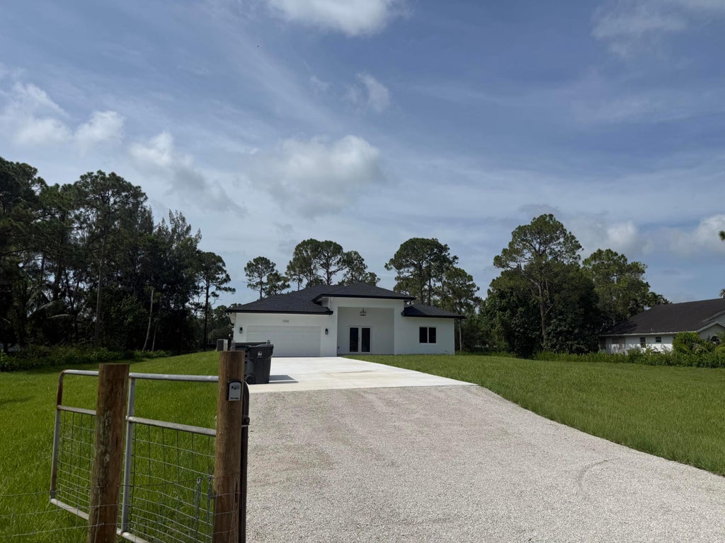 Photo of 11222 61ST Street N, The Acreage, FL 33412 (MLS # B26057233)