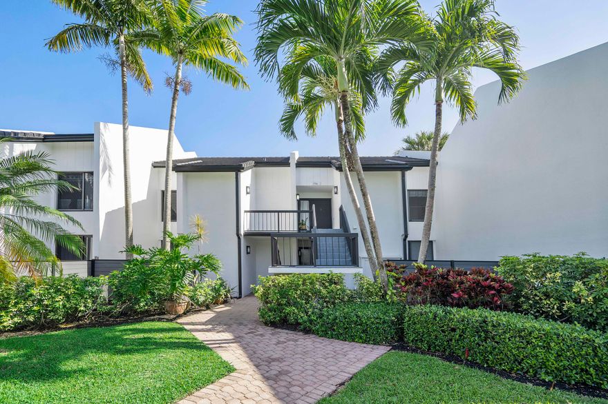 Welcome to your new home in Boca West--where luxury, lifestyle, and the best location comes together effortlessly. Ideally situated right beside the brand-new Athletic Club and Spa, you'll enjoy immediate access to the spectacular resort-style pool, beachside dining, state-of-the-art fitness center, Pilates studio, beauty salon, and fully equipped weight room--an unmatched convenience that truly sets this residence apart.

Perfectly positioned across from the golf course with a tranquil lake behind, this home captures breathtaking golf and water views from two private balconies. Inside, soaring cathedral ceilings enhance the spacious living and dining areas and extend into the primary suite, which features three generous closets for exceptional comfort and storage. The building has been The building has been completely painted on the exterior and features brand-new roofs, offering both beauty and peace of mind.

This is more than a condominium--it's your opportunity to live in one of South Florida's most prestigious and stylish golf and country club communities. Mandatory membership required.