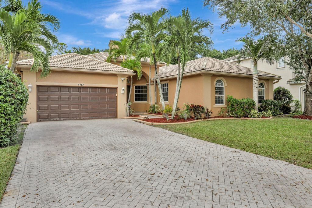 Photo of 4767 NW 72nd Place, Coconut Creek, FL 33073 (MLS # R10934698)