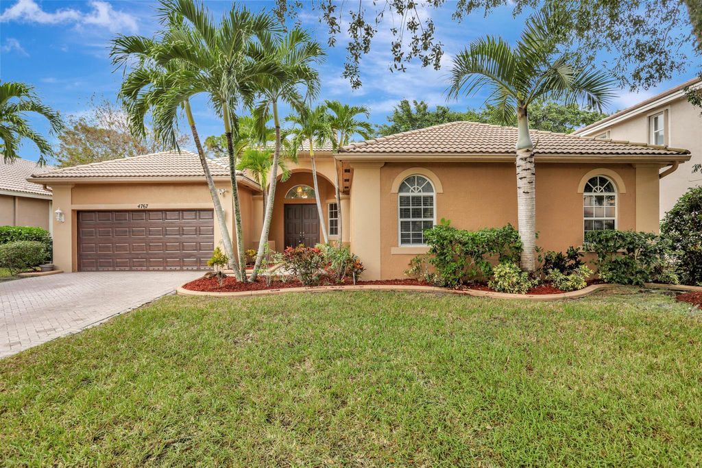 Photo of 4767 NW 72nd Place, Coconut Creek, FL 33073 (MLS # R10934698)