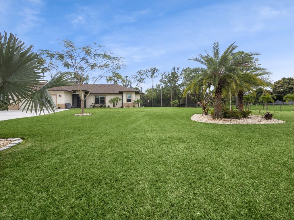 Photo of 13926 78th Place, West Palm Beach, FL 33412 (MLS # F10424621)