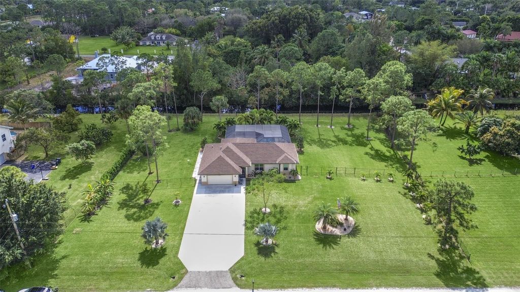 Photo of 13926 78th Place, West Palm Beach, FL 33412 (MLS # F10424621)