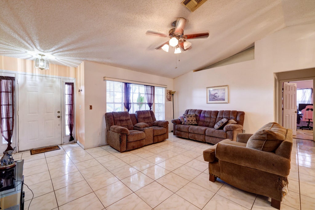 Photo of 3901 SW Jarmer Road, Port Saint Lucie, FL 34953 (MLS # R10961567)