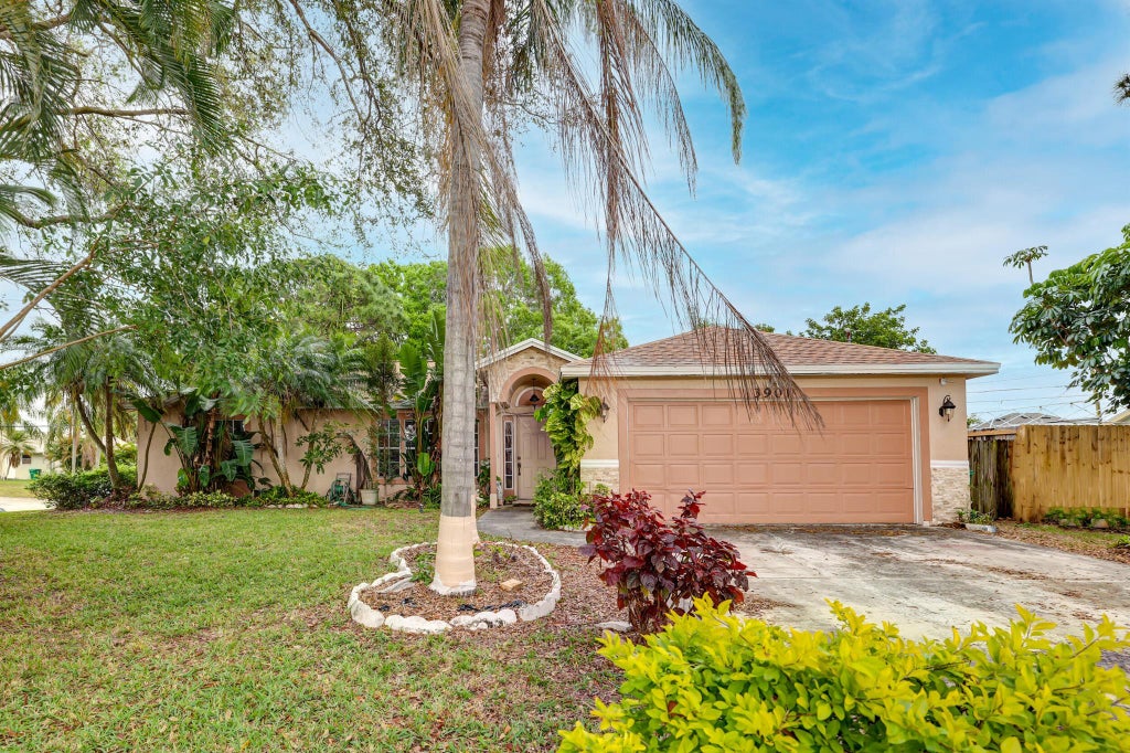 Photo of 3901 SW Jarmer Road, Port Saint Lucie, FL 34953 (MLS # R10961567)