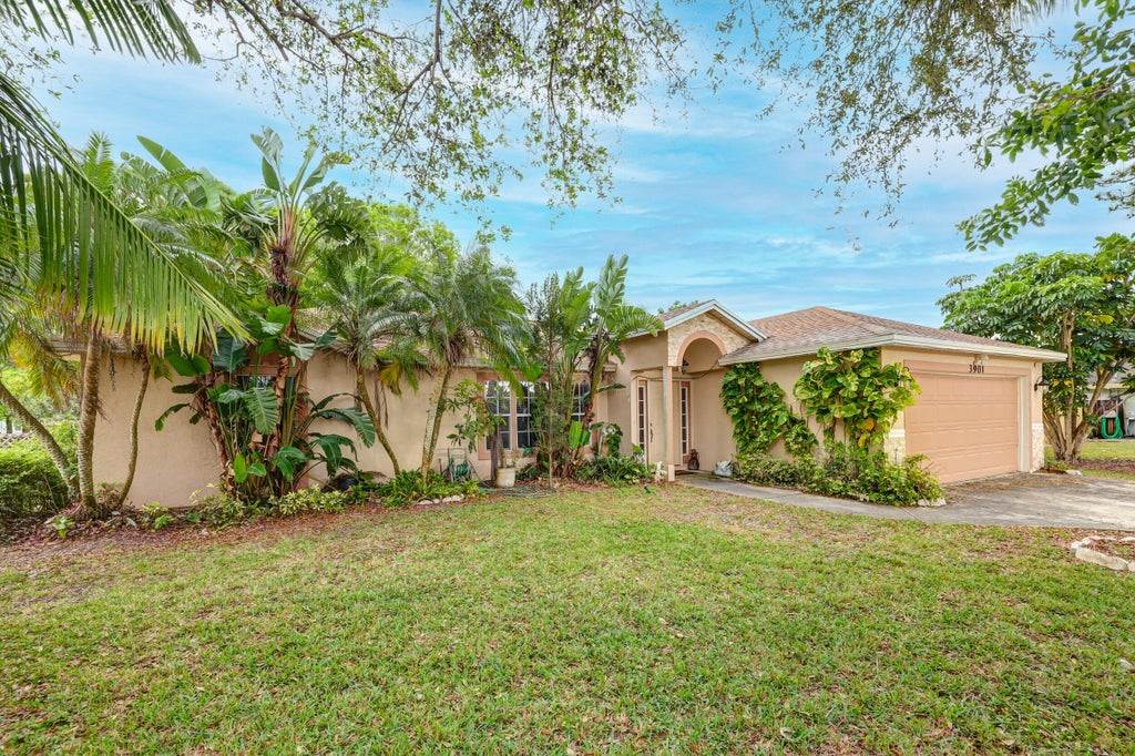 Photo of 3901 SW Jarmer Road, Port Saint Lucie, FL 34953 (MLS # R10961567)