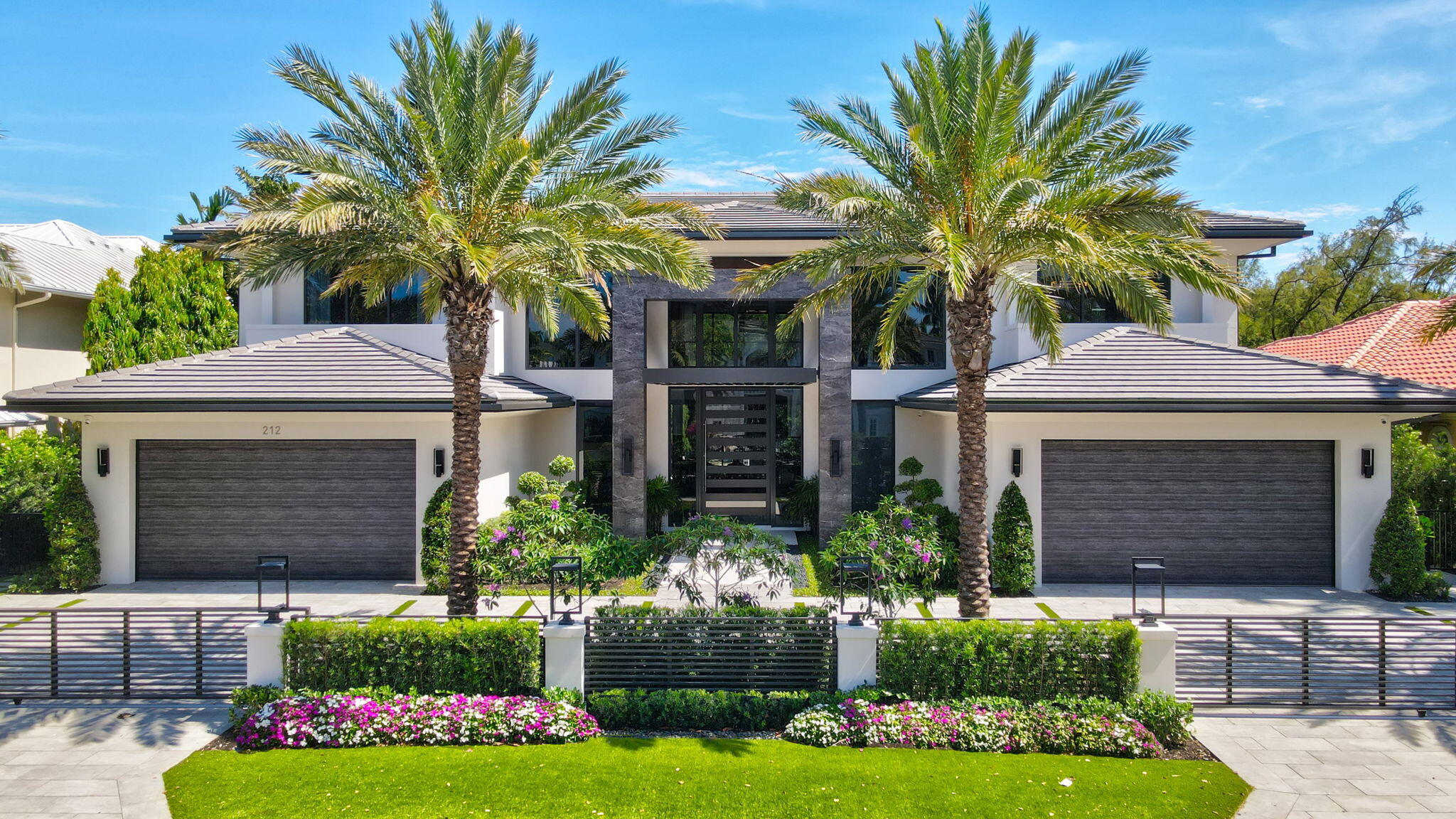 212 W Alexander Palm Rd| Brand new waterfront ultra-Luxury masterpiece sits on 100 ft of Royal Palm Waterway in Boca Raton's most prestigious community, Royal Palm Yacht & CC. Built by Albanese & Sons, Arch. by BE Designs, & Interiors by ZLMN Designs. This turnkey estate features 6 BD's 8.1 BA's, 9,306 Sq Ft. Interior & 13,185 Total Sq Ft. Enter into 2 story Lit Foyer,amazing Living Room w/ lavish private views of Capone Island. Private office, club room w/ bar & multiverse entertainment center. Lavish wine room, 2-way marble fireplace, formal dining, family Rm leads to dream chef's kitchen w/ luxury appliances, 4-car plus golf. 2nd Floor Primary Suite, Wellness Rm w/sauna & Steam Shower, Gym. Southern Exposure W/Infinity Edge Pool & Spa, Sunken Fire Pit, Control 4 smart House, Generator