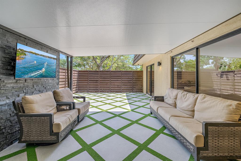 One of a kind townhome in PGA National's Glenwood. Open concept, extended living/ dining room for entertainment & additional first floor space. Can be converted back to 3rd bedroom if needed. Fully renovated 2022 - featuring quartz waterfall & backsplash, custom real wood white shaker cabinets, all new appliances, (A.C & WH too) Full lutron electrical package & all custom glass. Outside the entertainment continues with new porcelain tile & turf design sitting under the custom flat roof. Within close proximity to PGA Nationals Resort/ Amenities as well as Turnpike, i95, shopping & plenty of dining this is a must see!