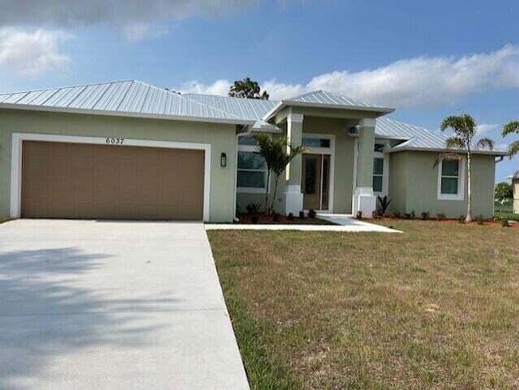 Photo of 6037 NW Winfield Drive NW, Port Saint Lucie, FL 34986 (MLS # R11011621)
