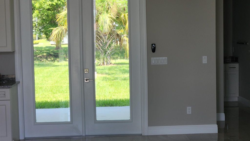 Photo of 6037 NW Winfield Drive NW, Port Saint Lucie, FL 34986 (MLS # R11011621)