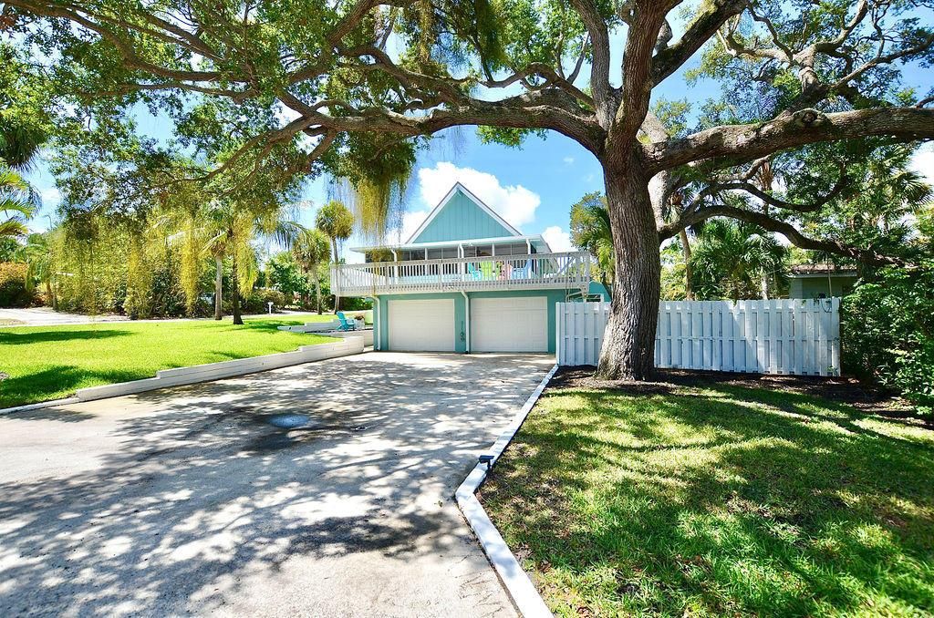 Photo of 1396 NE Waveland Avenue, Jensen Beach, FL 34957 (MLS # R10723389)