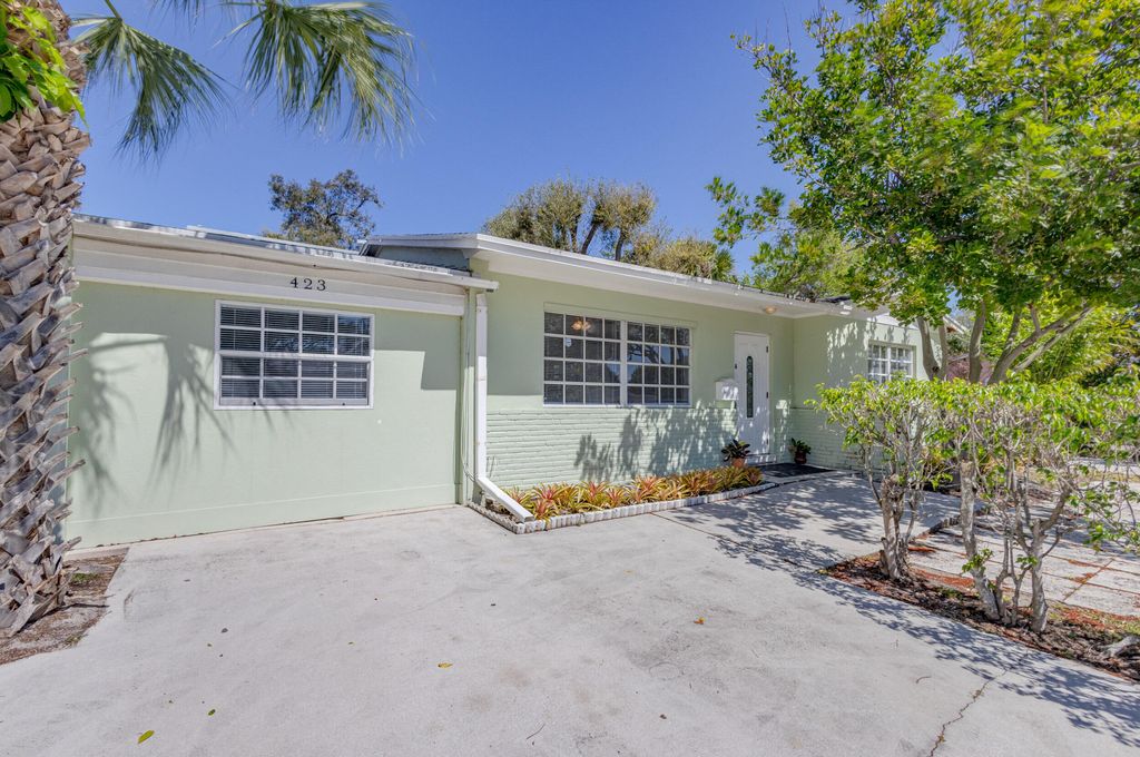 Photo of 423 Date Palm Drive, Lake Park, FL 33403 (MLS # R10964327)