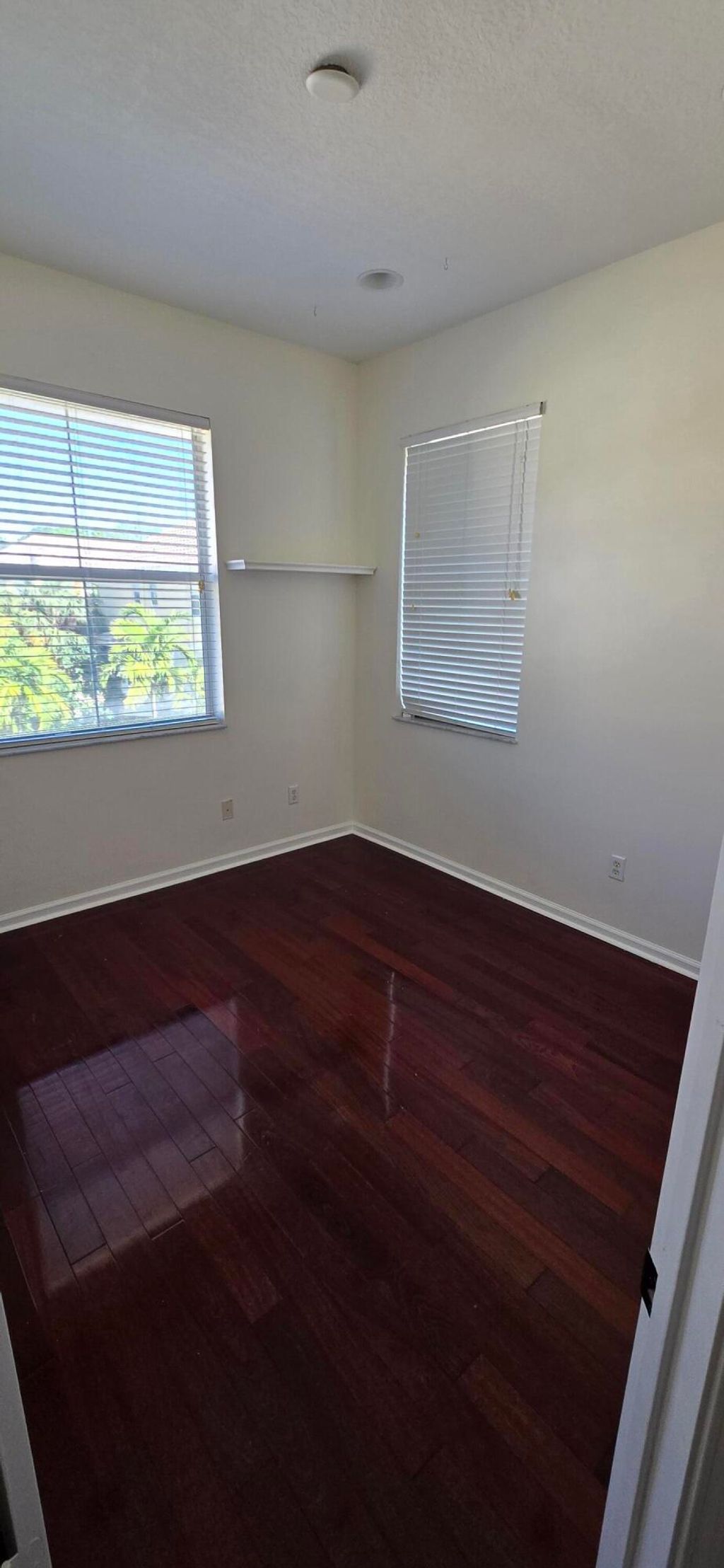 Photo of 3919 Passion Flower Road, Coconut Creek, FL 33073 (MLS # B26009976)