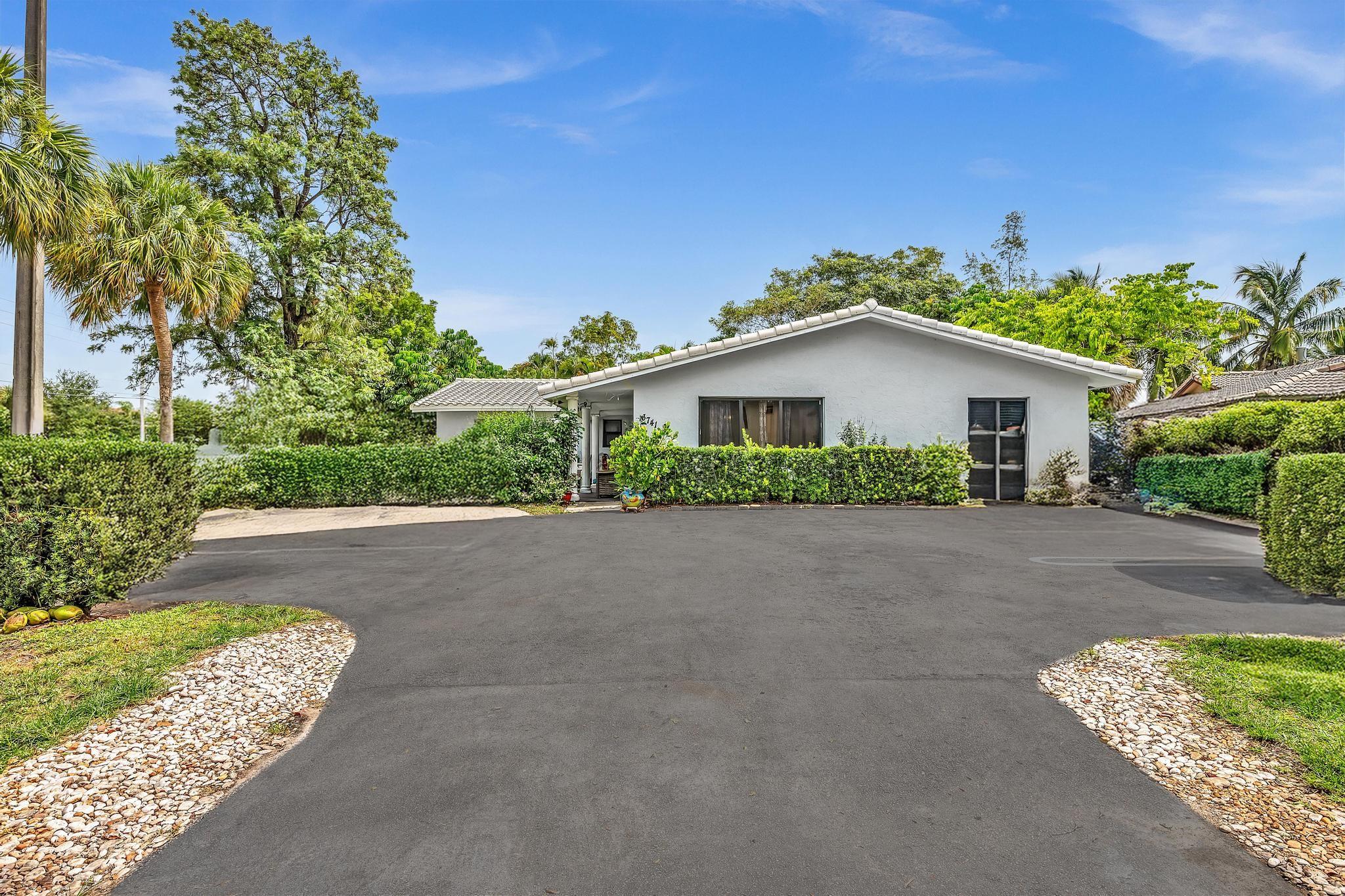 WOWZER!! INCOME PRODUCING TRIPLEX IN THE HEART OF HOT CORAL SPRINGS RENTAL MARKET, FULLY RENTED. LARGE CORNER LOT, LUSHKY LANDSCAPED. BARREL TILE ROOF 5 YEARS NEW, IMPACT WINDOWS. UNITS ARE ALL TILED. SEPERATE COIN OPERATED LAUNDRY FOR ADDITIONAL INCOME.