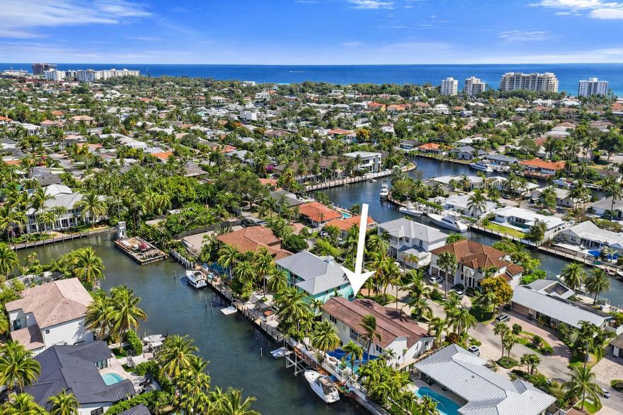 A rare opportunity and a true boater's dream with direct ocean access and no fixed bridges, this expansive two-story waterfront residence offers over 4,400 square feet of exceptional living space in the highly sought-after Venetian Isles of Lighthouse Point. The first-floor primary suite is a private retreat featuring a custom oversized walk-in closet, beautifully updated bath, and a stunning morning room with breathtaking water views. Designed for effortless entertaining, the home offers two dining areas, a custom bar with an oversized wine cooler, a modern updated kitchen with eat-in seating, a spacious living room, private office, sitting room, and a convenient half bath. Upstairs, a functional loft living space complements four generously sized bedrooms--each with impressive walk-in- closets--and two full bathrooms.
 
Outdoors, the South Florida lifestyle truly comes to life with a large pool surrounded by an expansive pool deck--ideal for entertaining or relaxing in total privacy. An outdoor cabana bath adds convenience, and a dedicated storage room provides ample space for boating and fishing equipment.

Hurricane-impact windows, a backup generator, and a 500-gallon underground propane tank provide added security and peace of mind. Boating enthusiasts will appreciate the 90-foot dock, boat lift, and quick access to the Hillsboro inlet and Lake Boca.

An exceptional opportunity to enjoy expansive canal-front living, generous square footage and premier boating access in one of Lighthouse Point's most desirable waterfront communities.