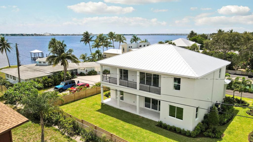 Photo of 1013 NE Orange Avenue, Jensen Beach, FL 34957 (MLS # R11145328)