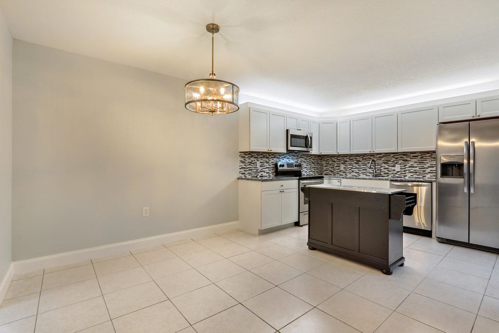 Photo of 2403 24th Lane, Palm Beach Gardens, FL 33418 (MLS # B26011223)