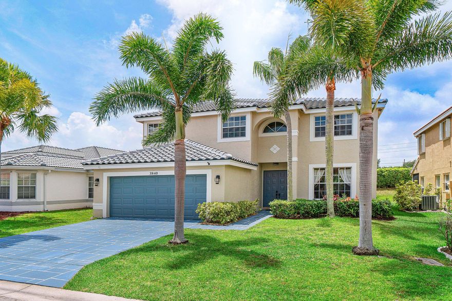 Framed by swaying palm trees and lush landscaping, this thoughtfully designed 4BR/2.5BA home offers timeless appeal in an all-age community. With a BRAND NEW ROOF 2026. Inside, spacious interiors, upgraded spaces, and a welcoming palette of warm browns & soft neutrals create an inviting feel throughout. The open kitchen/family room serves as the heart of the home, featuring wood cabinets, a custom island, vented cooktop, wall oven & microwave & a sunlit breakfast nook. The primary bedroom offers tray ceilings and an en-suite with dual sinks, soaking tub, glass-enclosed shower & water closet. New A/C in 2025. Designed to embrace Florida living, the interior flows seamlessly to the covered and screened lanai and adjoining open patio.  creating inviting spaces to relax, dine, and entertain. Beyond, the fenced backyard provides flexible space for pets, play, and gardening. Build a pool!  Additional highlights include smooth ceilings, full hurricane protection (panels), and a 2-car garage. Furniture negotiable. Located in Nautica Sound, a gated, all-age community offering residents a clubhouse, pool and sun deck, gym, tennis court, two pickleball courts, basketball court, sand volleyball court, children's playground, and beautifully maintained grounds shaded by mature trees throughout the community. Enjoy this Boynton Beach location near shopping, dining, parks, and recreation, with easy access to I-95, Florida's Turnpike, Downtown Delray Beach, Boca Raton, West Palm Beach, Palm Beach International Airport, and South Florida's beautiful beaches!