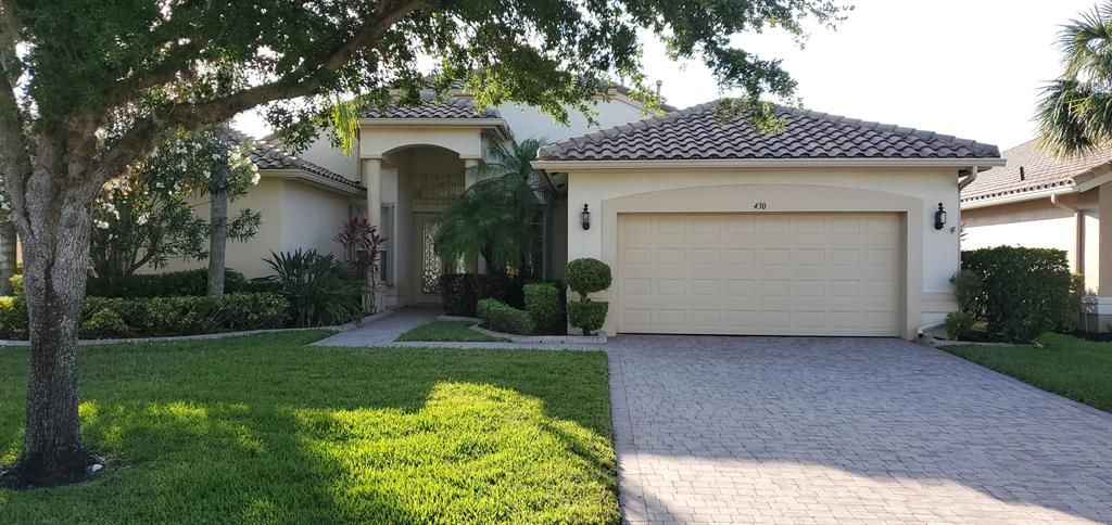 Photo of 430 NW Shoreview Drive, Port Saint Lucie, FL 34986 (MLS # R10710409)