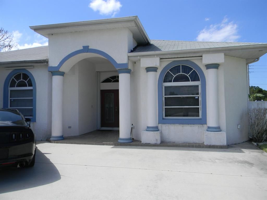 Photo of 5837 NW Arley Court, Port Saint Lucie, FL 34986 (MLS # R10715002)