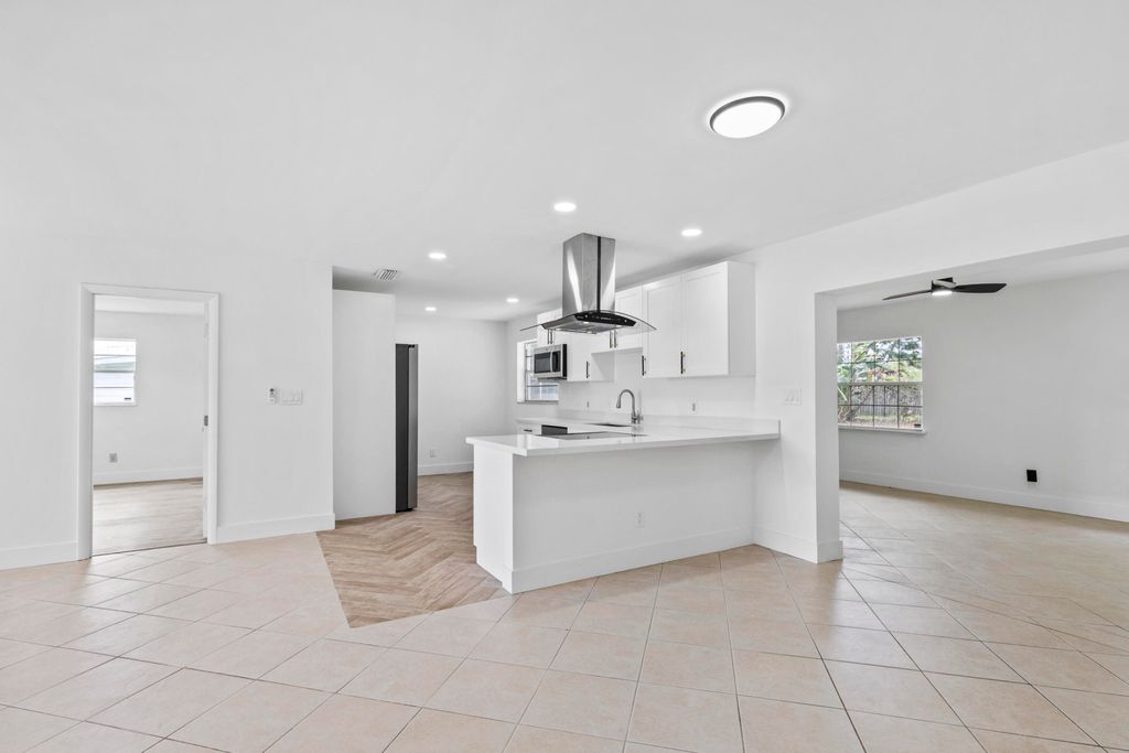 Photo of 106 NW Curtis Street, Port Saint Lucie, FL 34983 (MLS # B26011749)