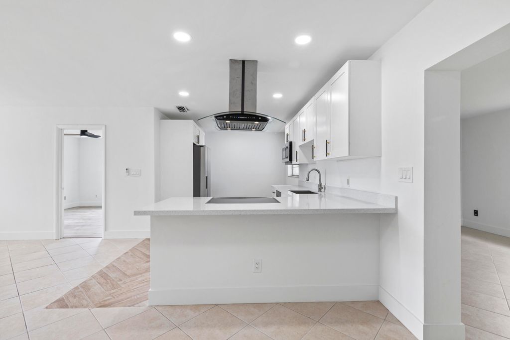 Photo of 106 NW Curtis Street, Port Saint Lucie, FL 34983 (MLS # B26011749)