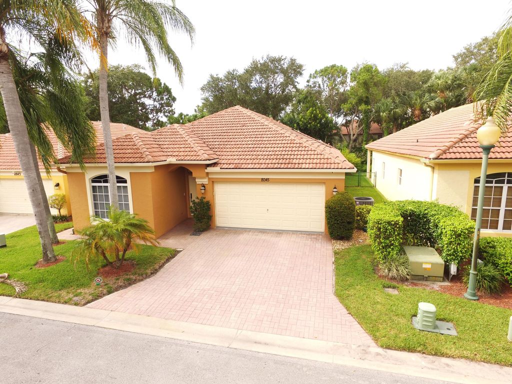Photo of 8045 Via Hacienda, Riviera Beach, FL 33418 (MLS # R10809777)