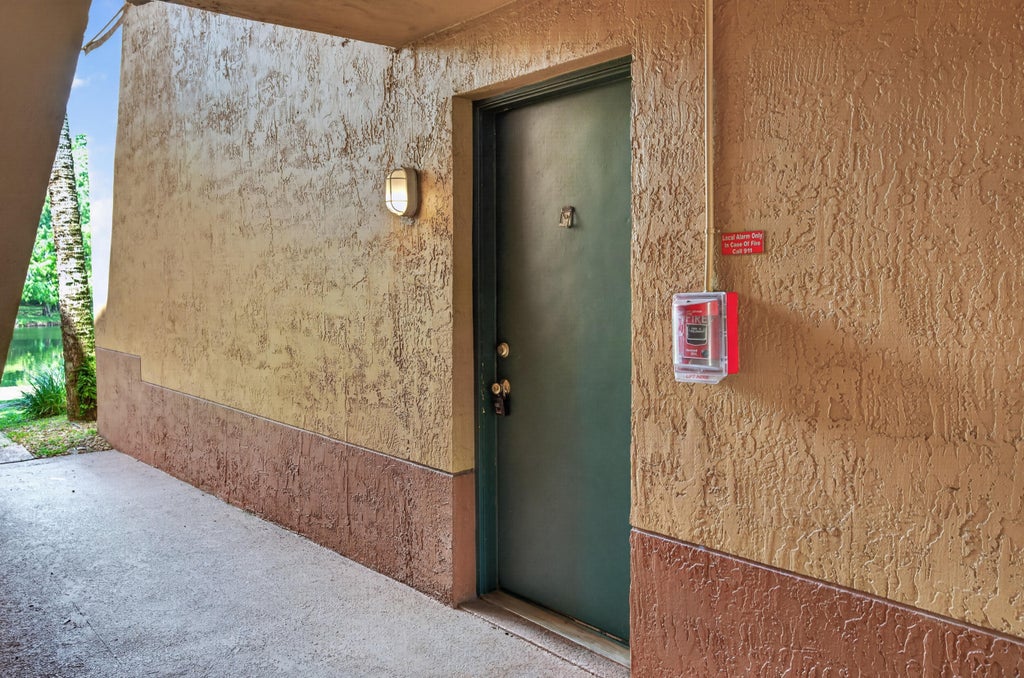 Photo of 10717 E Cleary Boulevard E #106, Plantation, FL 33324 (MLS # B26070669)