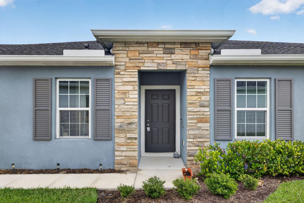 Photo of 9449 SW Libertas Way, Port Saint Lucie, FL 34987 (MLS # B26031042)