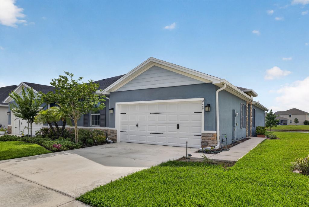 Photo of 9449 SW Libertas Way, Port Saint Lucie, FL 34987 (MLS # B26031042)