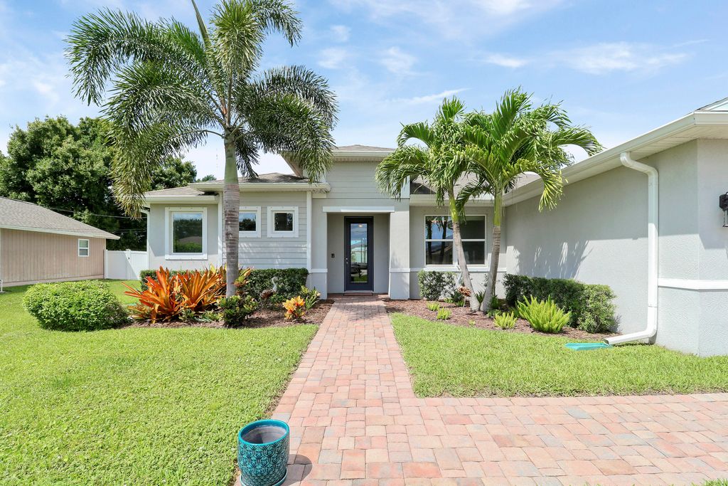 Photo of 4312 SW Taluga Street, Port Saint Lucie, FL 34953 (MLS # R11112434)