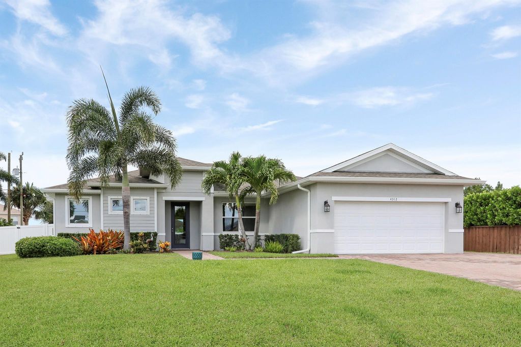 Photo of 4312 SW Taluga Street, Port Saint Lucie, FL 34953 (MLS # R11112434)
