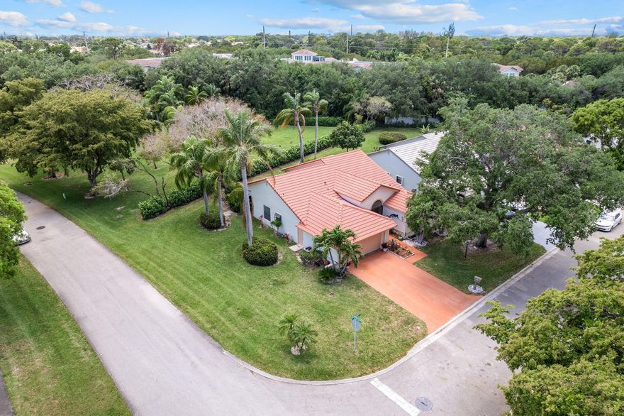 Palm Shores a 55+ pet friendly well-kept community with sidewalks that enhance the neighborhood's charm.  Nestled on a corner lot this home tucked inside Boynton Bch's most inviting communities.  This home features a desirable split floor plan that offers added privacy & comfort. The layout includes spacious living areas, high ceilings, featuring 3 bdrms, 2 baths, a 2-car garage & an enclosed patio overlooking a private backyard ideal for year-round enjoyment. Prime Boynton Beach location near parks, shops and restaurants, this home offers everyday comfort.  The low HOA provides outstanding value, including access to a Clubhouse which includes community heated pool, spa, pickleball courts, fitness center, library, game rooms, sauna, cable TV, ADT security, roof cleaning, lawn care & more.