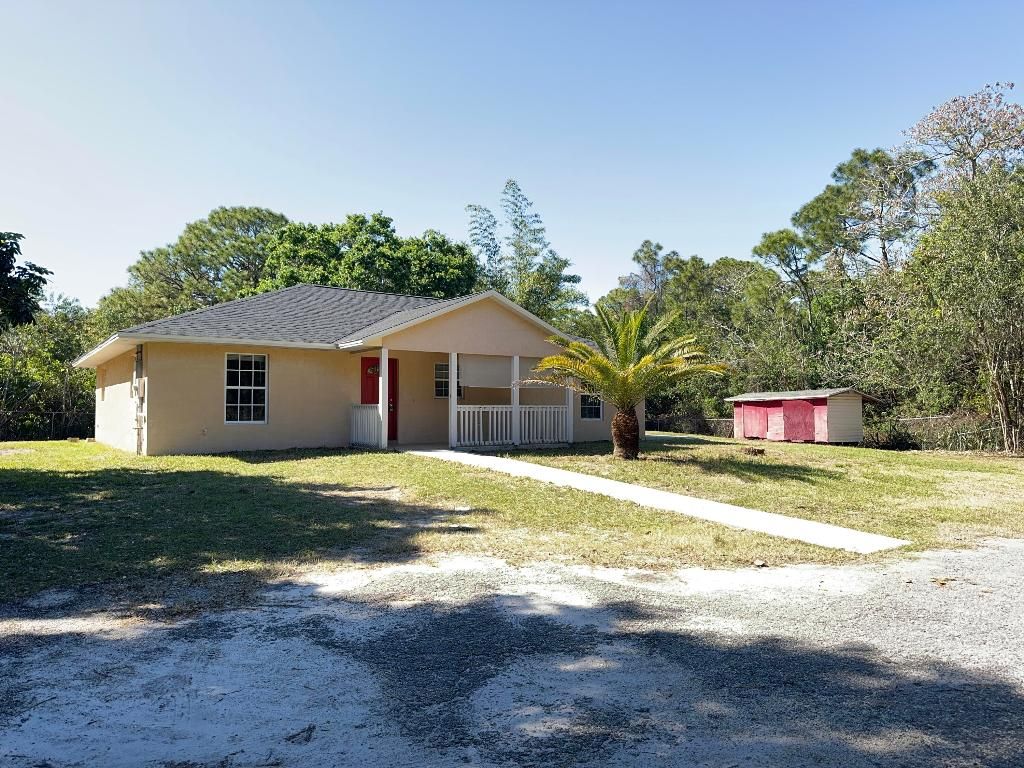 Photo of 620 W Weatherbee Road, Fort Pierce, FL 34982 (MLS # R10962206)