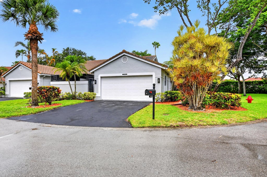 Photo of 10523 Ladypalm LN #B, Boca Raton, FL 33498 (MLS # B26046886)