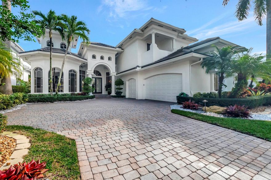 Beautiful just painted 2-story 5 bedroom, 7 bath plus office home with a dynamic flow and sweeping lake views.  Every bedroom is ensuite.  Primary and 2 additional bedroom are on the 1st floor and 2 bedrooms and loft on the 2nd floor.  Office has built-ins and high ceilings.  One of a kind view from the backyard of the lake, garden and pool.  Relax on your screened-in patio.Whole house generator.  New flat roof in 2022.