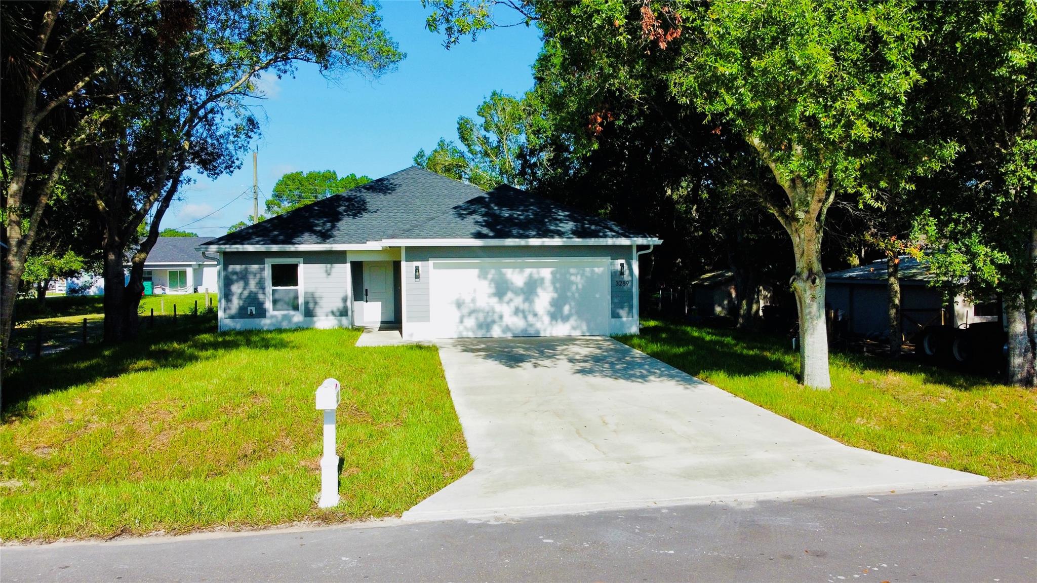 BRAND NEW 2025 NEW CONSTRUCTION. NO HOA. LUXURY FINISHES. STORM PROOF WINDOWS. WASHER/DRYER. GUTTERS. 10 FT VAULTED CEILINGS. QUARTZ COUNTERTOPS. PORCELAIN WOOD TILE.
Modern 3BR/2BA home. Check off all the boxes with an open floor plan, large kitchen island with quartz counter tops and bathrooms, foyer, pantry closet, covered front porch, 2-car garage, covered back porch and impact windows and doors (don’t get stuck putting up shutters during a hurricane). Â
Additional features include gutters all the way around the home, pre-installed by the builder, and spray foam insulation to help lower the electric bill in the hot summers.
Washer and dryer included from the builder. Available, August 2025.