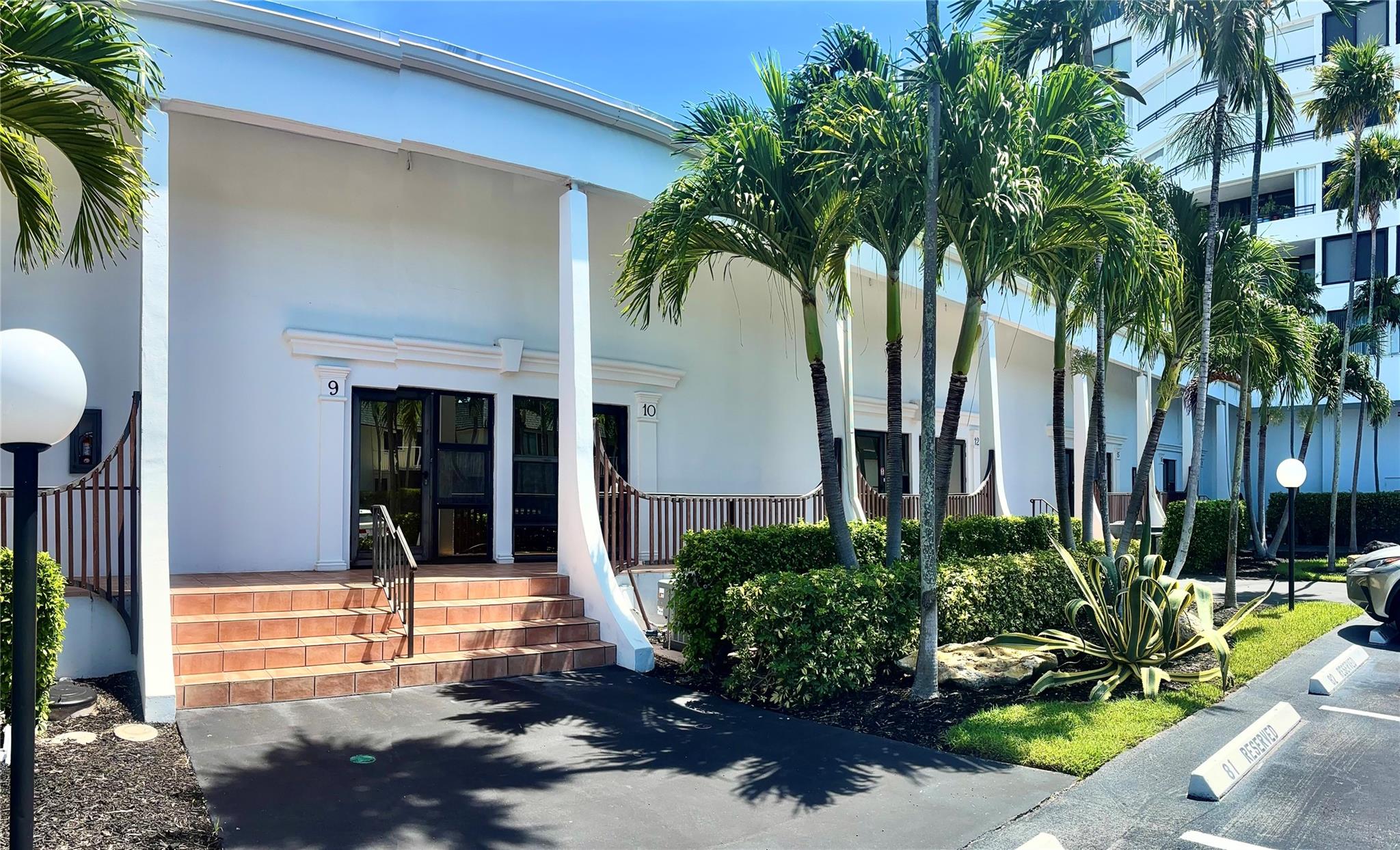 OPEN HOUSE SUN 27th from 12=2pm. Finally, an affordable piece of real estate in this beautiful lanai townhome with private, deeded beach access. Whether you are looking for a year round residence or a delightful vacation home, this unit will not disappoint. One bedroom & two full bathrooms. Dramatic volume ceilings. Huge impact doors open to good sized balcony with relaxing views of the gardens and pool. Open Kitchen to Living Area. Laundry room. Upstairs bedroom with full bathroom & spacious closets. Amenities include 2 pools, fitness room, community room with kitchen & bathrooms, sundeck, bike room, car wash, 24 hour door person. Parking right in front. Come see for yourself to appreciate. Walk across the street to your private beach!