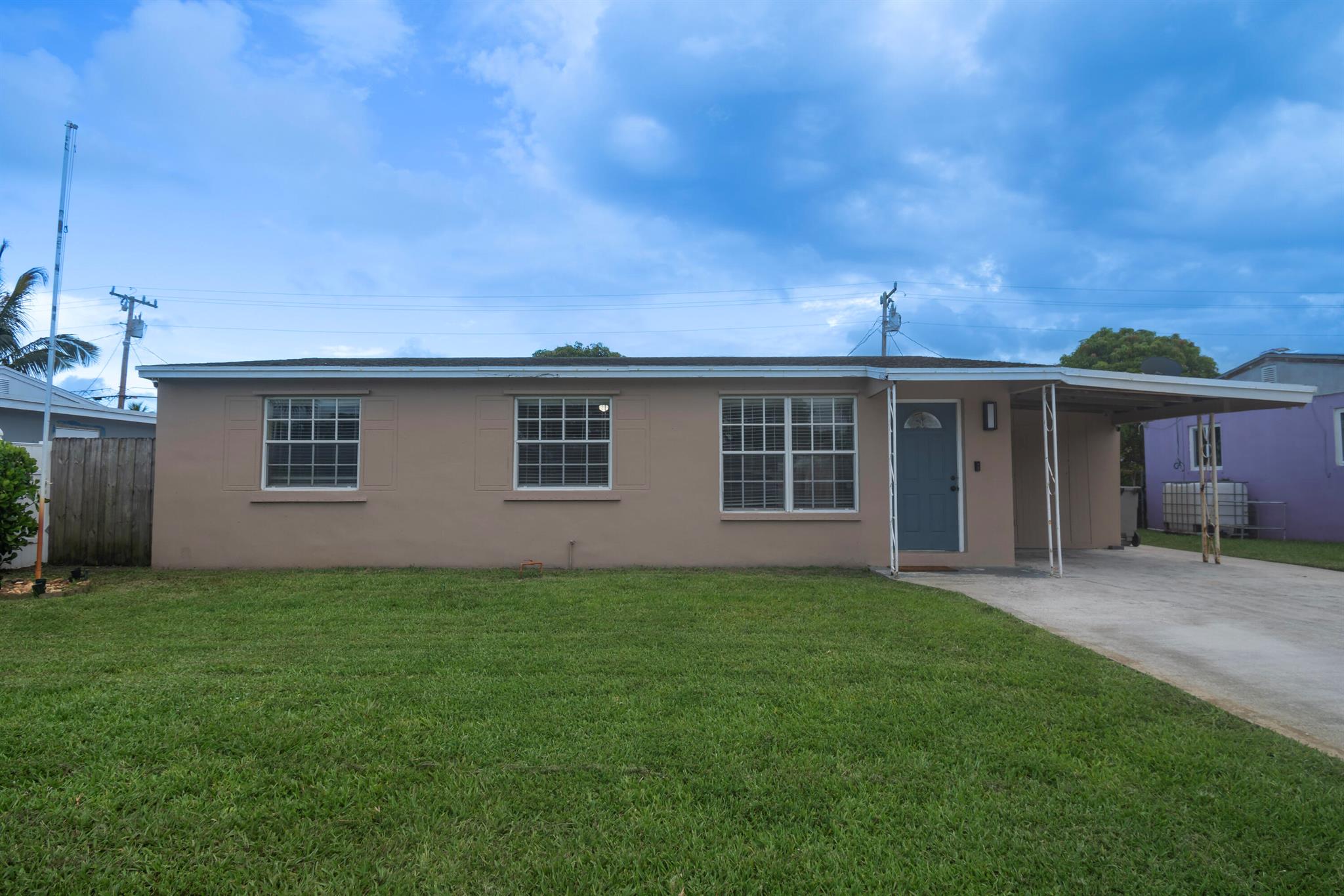 Available for Rent - Just Minutes from CityPlace!This well-located 3-bedroom, 1-bath home offers convenience and comfort just minutes from downtown West Palm Beach. Features include a spacious fenced yard, a detached shed (ideal for tools or business use), and a back patio perfect for relaxing or entertaining.The interior boasts hard ceramic tile throughout the main living areas, newer kitchen appliances, and updated laminate flooring in all bedrooms. All three bedrooms are positioned together and benefit from excellent natural light.Located close to shopping, dining, and major routes--this home offers functionality and location in one package. Quick approval process--schedule your showing today!