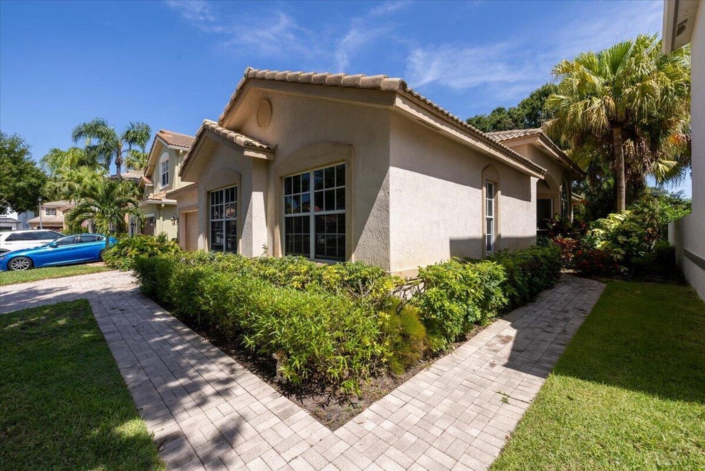 Photo of 4841 N CLASSICAL Boulevard, Delray Beach, FL 33445 (MLS # B26065771)