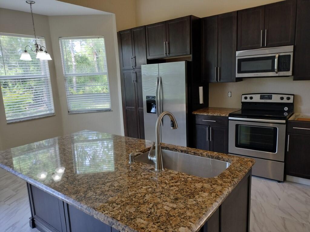 Photo of 5671 Sunberry Circle, Fort Pierce, FL 34951 (MLS # R10968587)